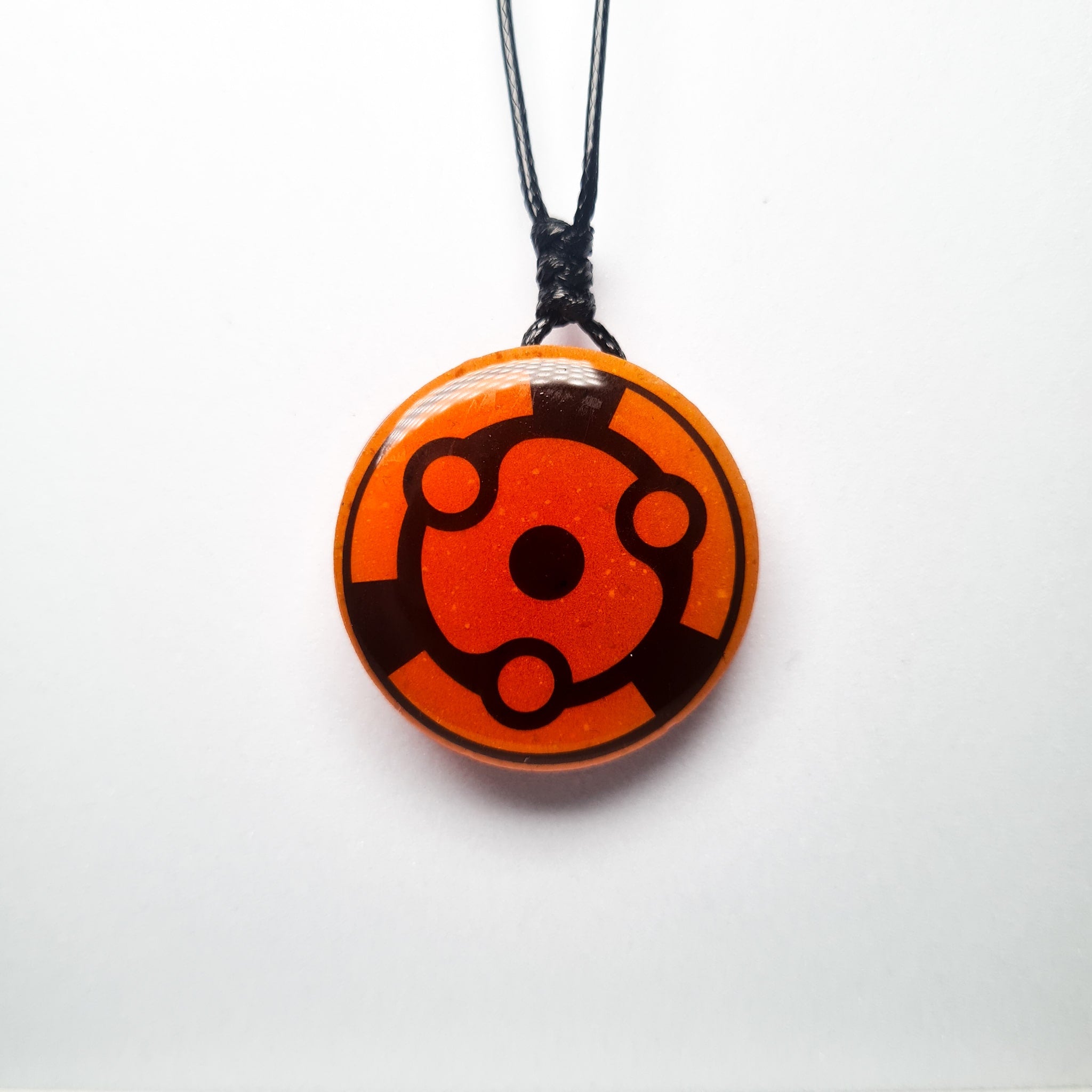 Naruto Inspired Madara's Mangekyou Sharingan Glow in Dark Resin Pendant