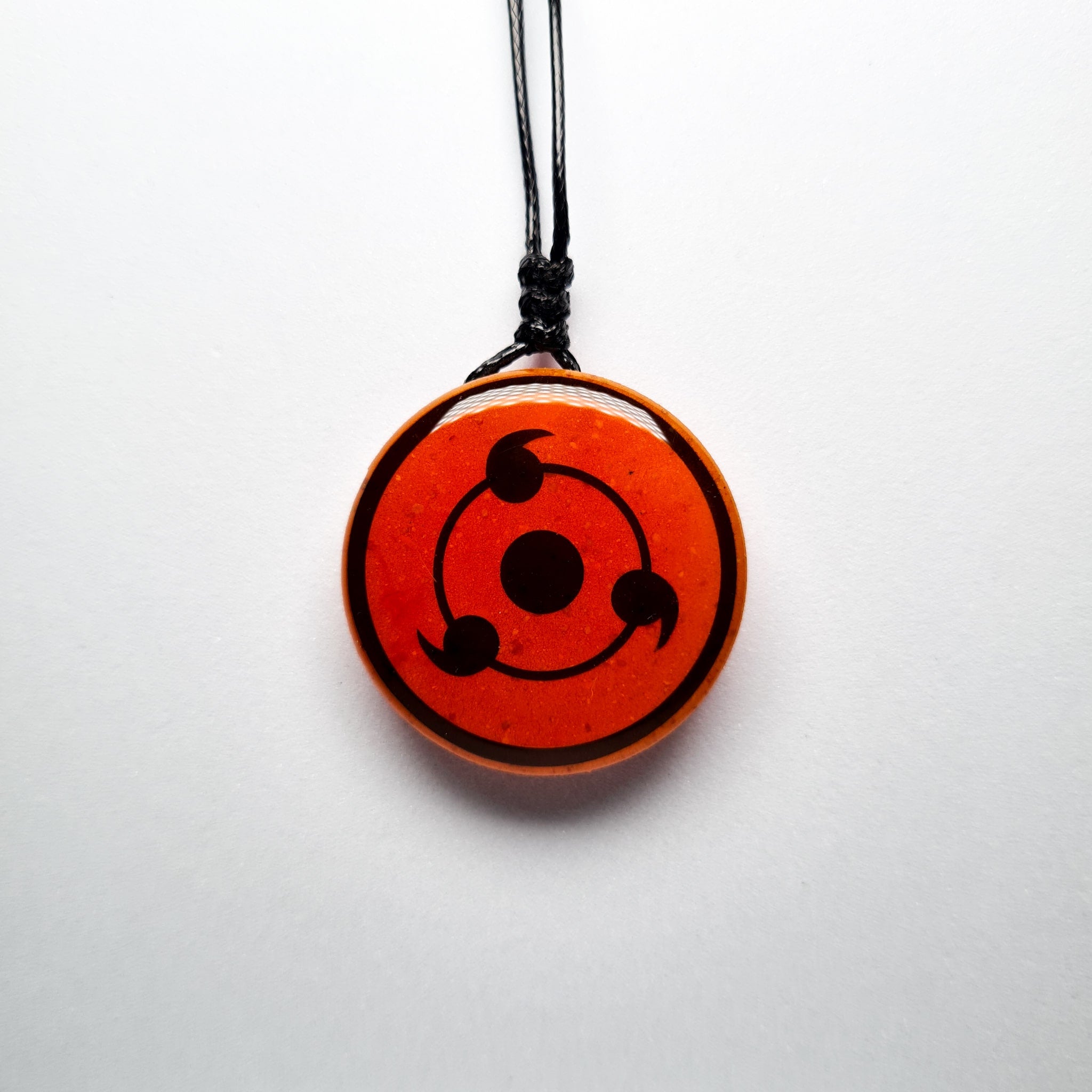 Naruto Inspired Three Tomoe Sharingan Glow in Dark Resin Pendant